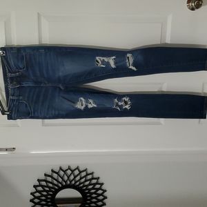 AE NEXT LEVEL STRETCH SIZE 4 HI-RISE JEGGING X RIPPED JEANS